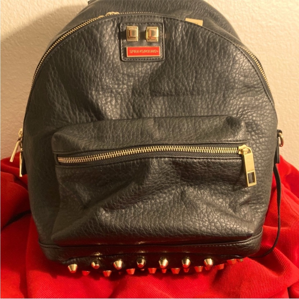 SPRAYGROUND limited edition. Black Leather Backpack with Gold Studs